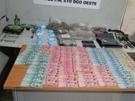Dintel ocupa drogas, armas y dinero en allanamiento en Los Alcarrizos